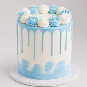 Skyline Blue and White cake with chocolate Drip