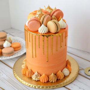 Orange buttercream cake with gold drip