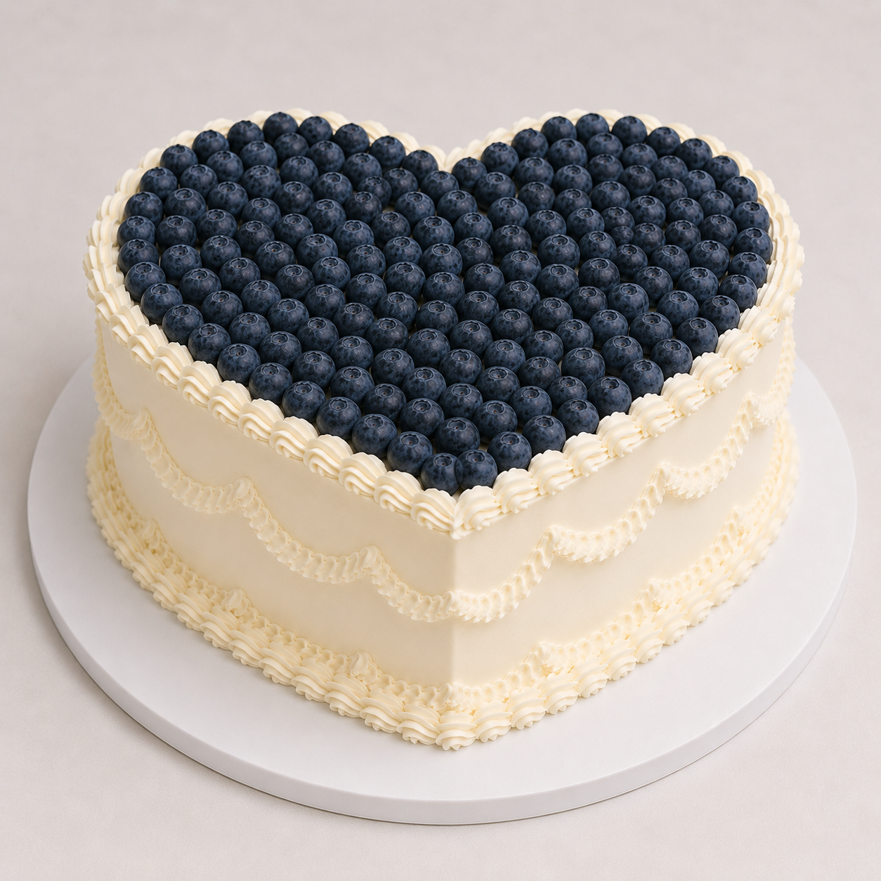 Blueberry heart cake on white stand 25cm