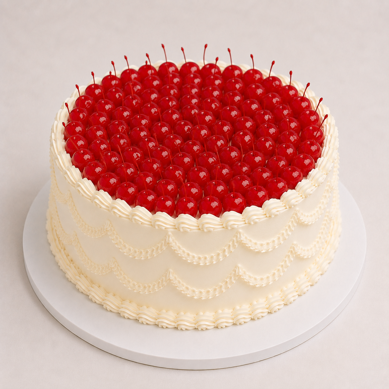 Elegant cherry-topped frosted cake Marashcino