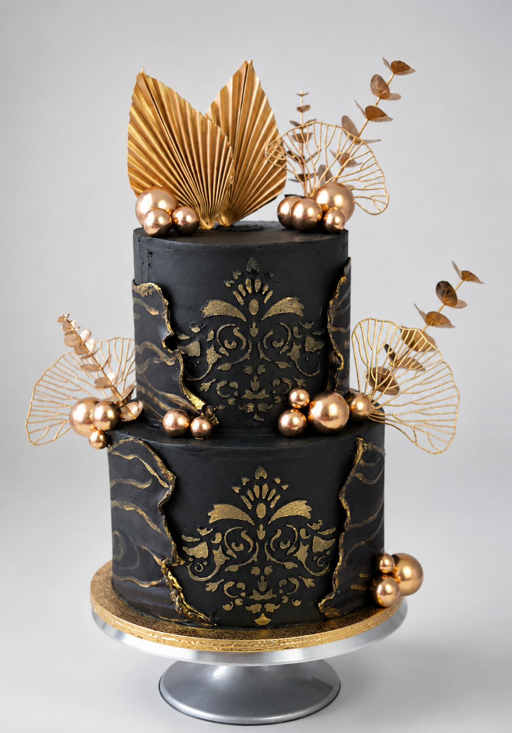 Black and gold custom two tier cake by Cape to Cake